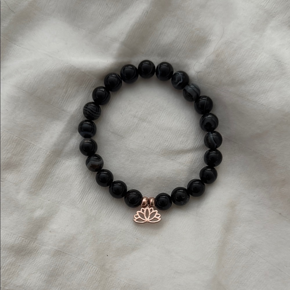 Elegant Black Beaded Bracelet with Rose Gold Lotus Charm